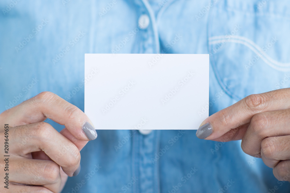 Hand holding mock up name card Hand holding mock up name card