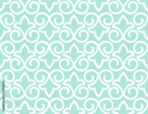 Wallpaper in the style of Baroque. A seamless vector background. White and blue floral ornament. Graphic pattern for fabric, wallpaper, packaging. Ornate Damask flower ornament