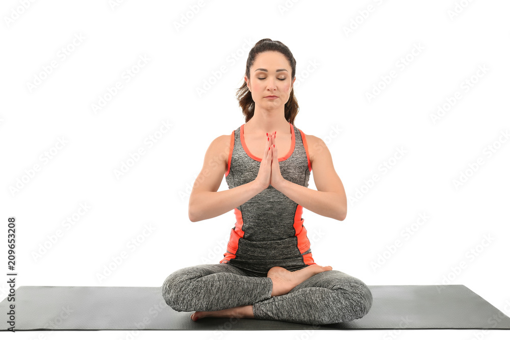 Fototapeta premium Beautiful woman practicing yoga on white background