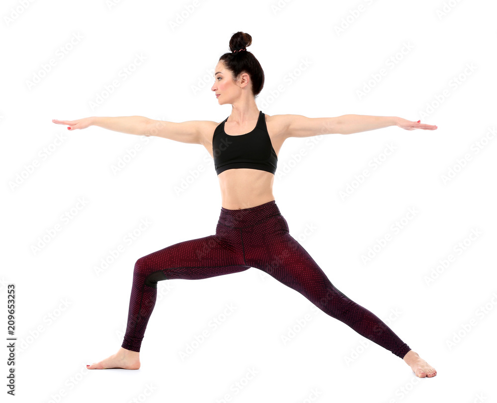 Beautiful woman practicing yoga on white background