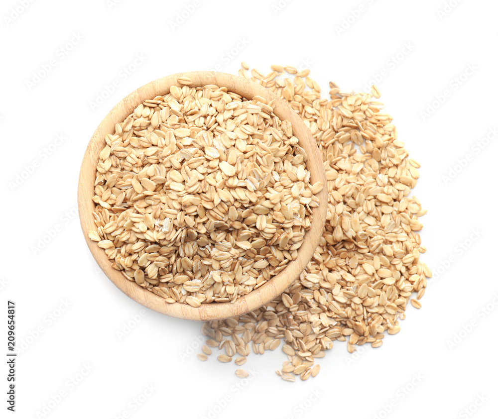 Bowl with raw oatmeal on white background Bowl with raw oatmeal on white background