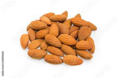 Pile of the shelled almonds on a white background