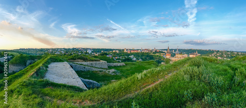 Kamianets-Podilskyi view with stone-earthen fortifications on foreground, Ukraine