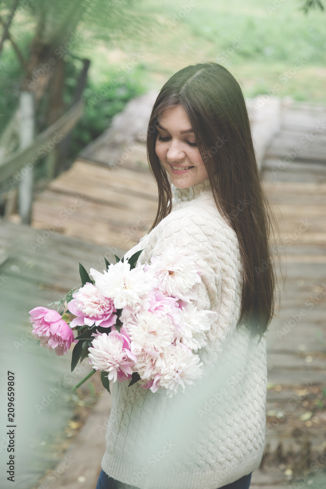 Girl with a bouquet of peonies Girl with a bouquet of peonies