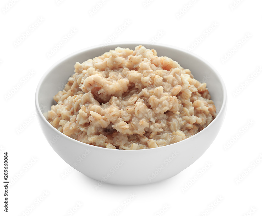 Bowl with prepared oatmeal on white background Bowl with prepared oatmeal on white background