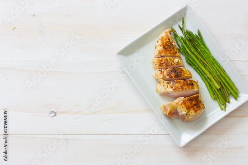 Grilled chicken fillet and asparagus