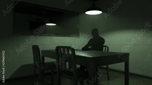 Animation of the interrogation room with dark silhouette of a handcuffed man.