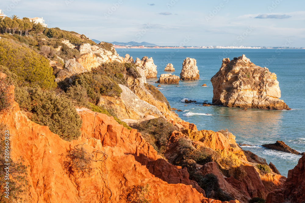Beautiful scenery, red rocks and ocean, Atlantic coast, Portugal, Algarve, Faro
