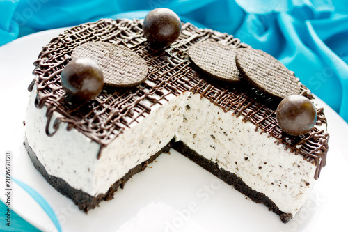 Chocolate cookies cheesecake, ice cream cake decorated with chocolate photo