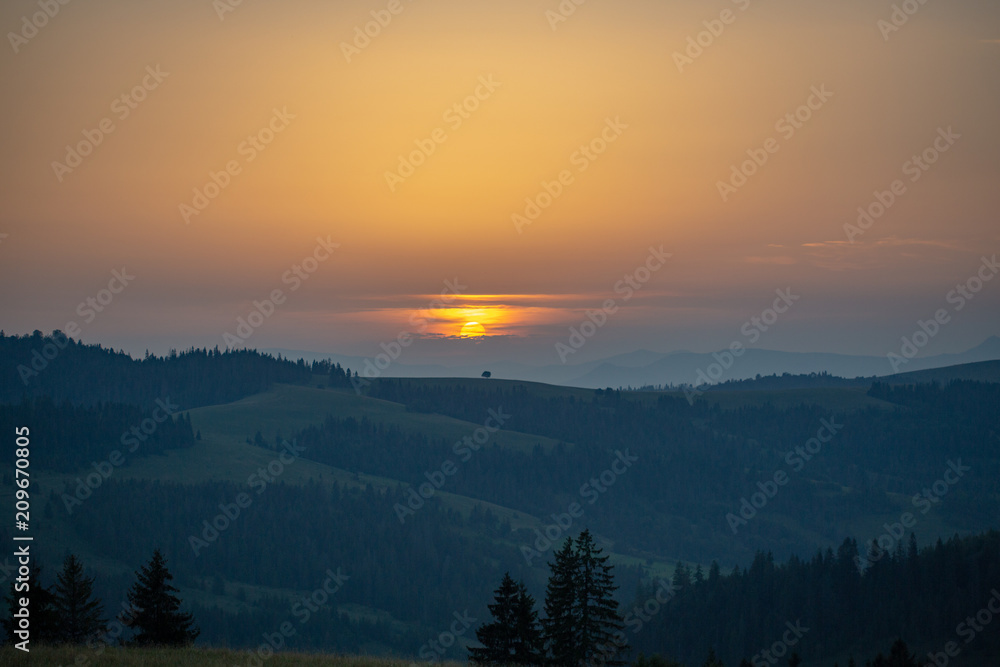 Mountain range on the background of the sunset