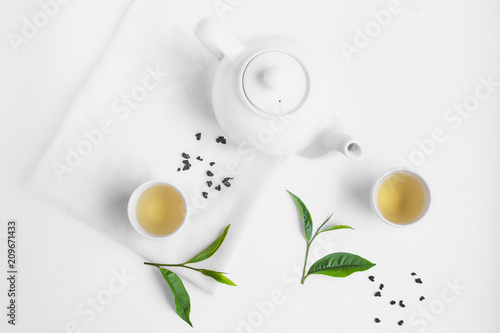Green tea In white cup White background aroma 