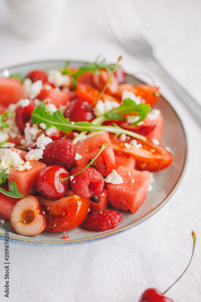 Summer salad with fruits and vegetables Summer salad with fruits and vegetables