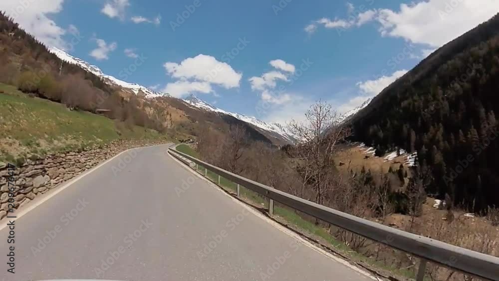 Driving car at Switzerland mountain countryside Driving car at Switzerland mountain countryside