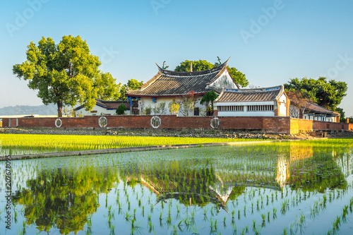 A traditional Taiwanese Mingnan architecture whit paddy field in Caotun, Nantou City.