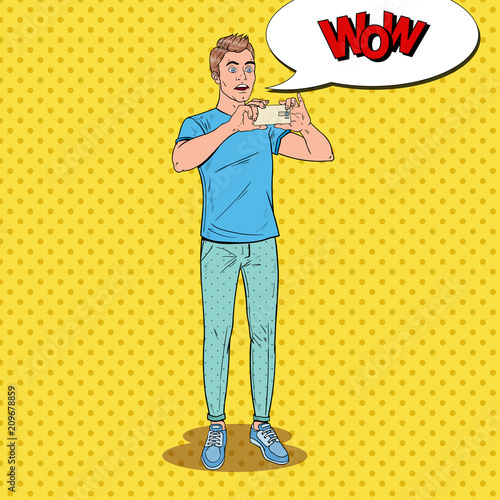 Pop Art Surprised Man Making Video on Smartphone. Teenager Guy Taking Photo on Mobile Phone. Vector illustration