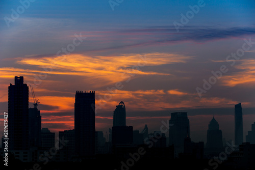 BANGKOK, THAILAND - JANUARY 16, 2018 : Silhouette of Bangkok city view with beautiful sunrise background