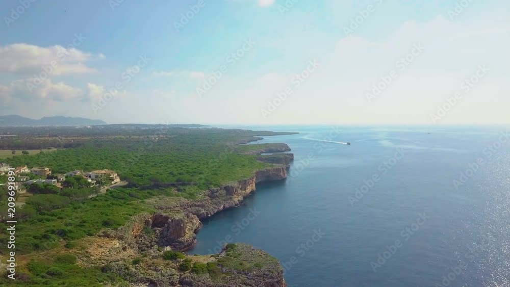 Aerial landscape of the beautiful bay of Cala Mandia with a wonderful turquoise sea, Porto Cristo, Majorca, Spain Aerial landscape of the beautiful bay of Cala Mandia with a wonderful turquoise sea, Porto Cristo, Majorca, Spain