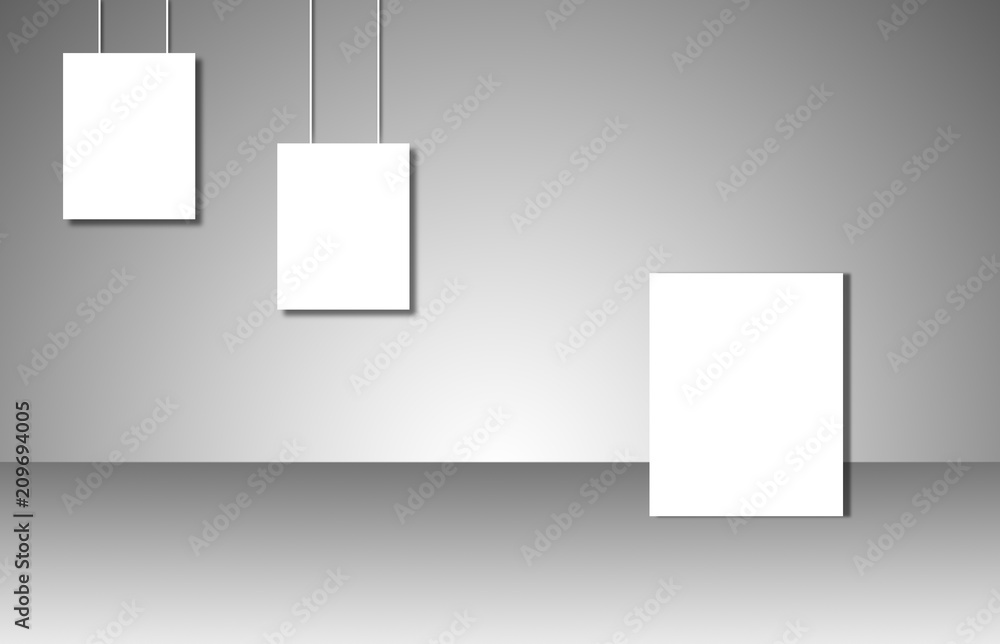 Empty white posters on gray background Empty white posters on gray background
