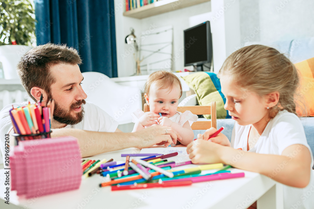 Fototapeta premium father and his baby daughter at home