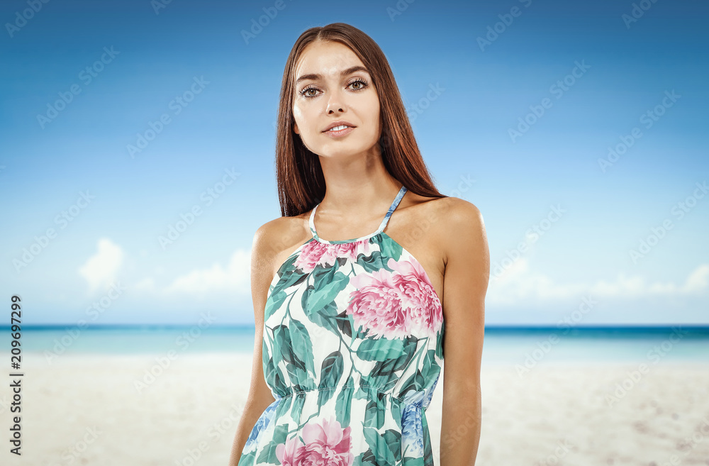 Beautiful young woman on the beach. Blurry beach and ocean background. Beautiful young woman on the beach. Blurry beach and ocean background.