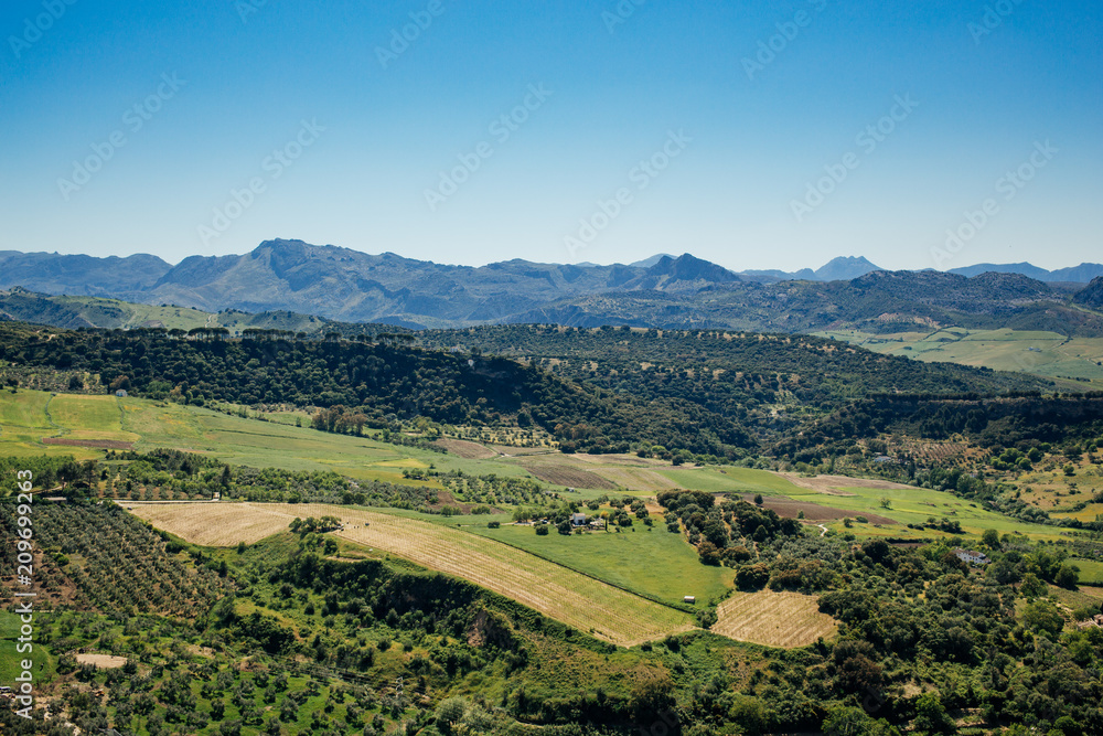 View of the countryside and the surrounding mountains from Ronad, Andalusia, Spain.