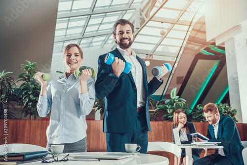 Fototapeta Naklejka Na Ścianę i Meble -  Healthcare Concept Workers Doing Fitness Exercises
