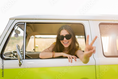 Young woman enjoying a roadtrip  