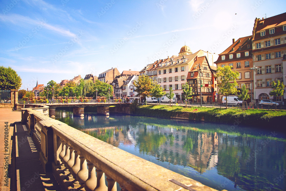 beautiful canal in Strasbourg, France, view of the river, park and architecture