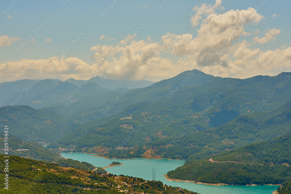 Mountain river valley landscape with cloudy sky in Alanya, Turkey. Mountain river valley landscape with cloudy sky in Alanya, Turkey.