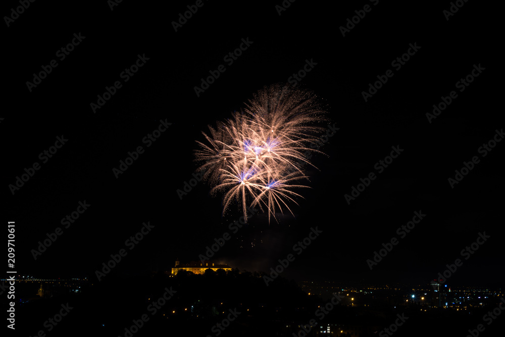 Beautiful colorful firework in city Brno on Spilberk