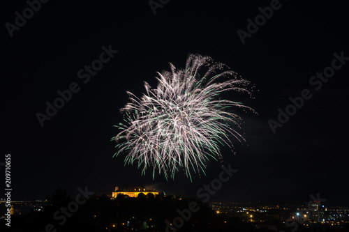 Beautiful colorful firework in city Brno on Spilberk
