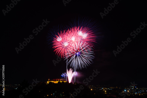Beautiful colorful firework in city Brno on Spilberk