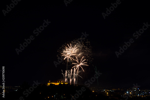 Beautiful colorful firework in city Brno on Spilberk