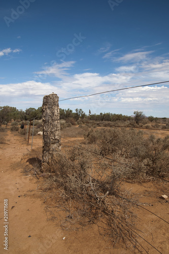 Hawker South Australia, wooden post and fence in the outback landscape photo