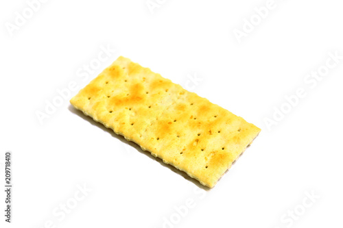 single yellow crakers on white background isolated