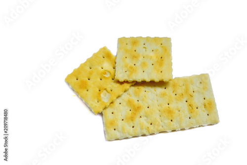 stack of yellow crakers on white background isolated