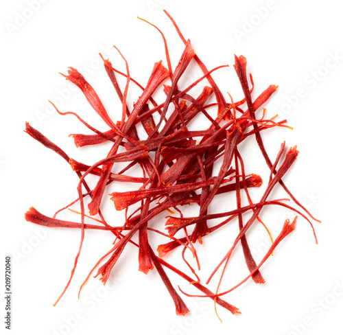 dried saffron threads isolated on white background, top view photo