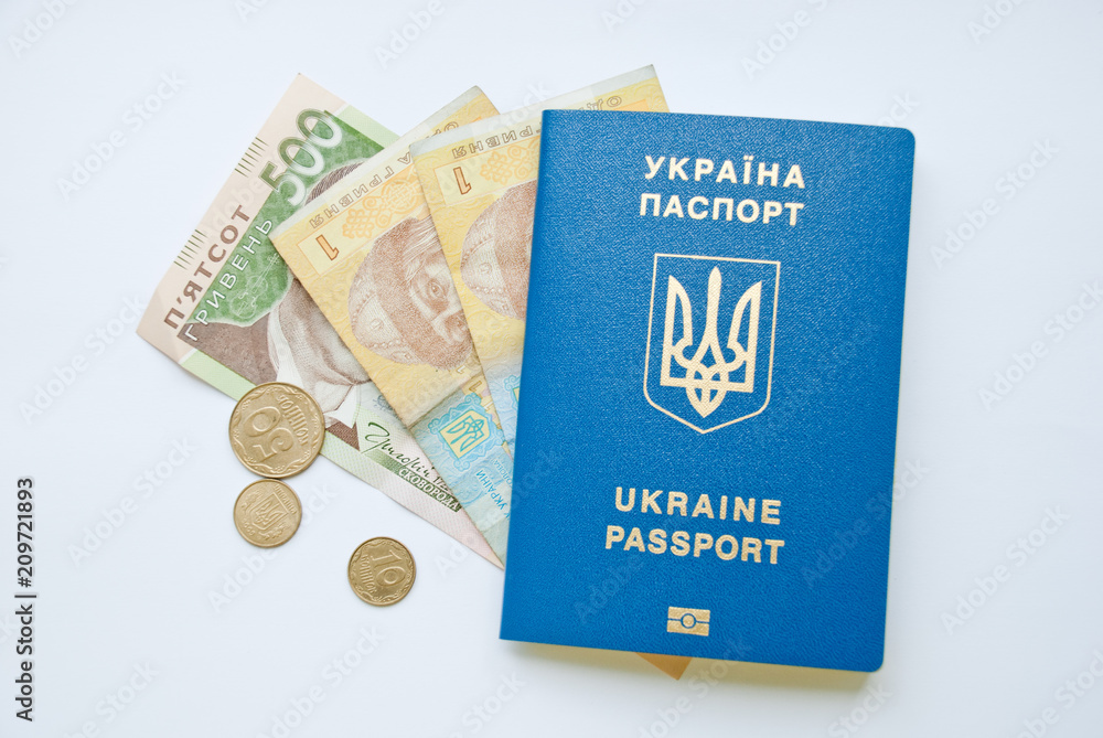 Fototapeta premium ukrainian biometric passport with money