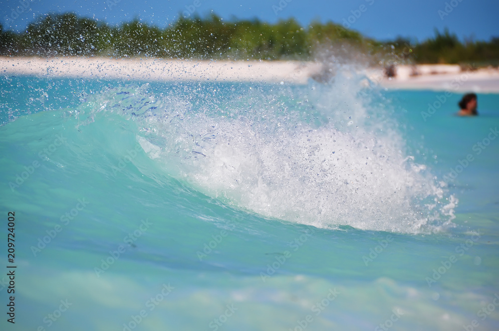 Emerald water and a wave on a tropical island. Cayo Largo,

