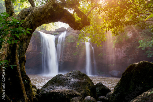 Beautiful waterfall with sunlight in jungle  Haew Suwat Waterfall.