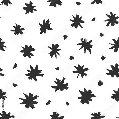 Vector creative seamless pattern with hand drawn brush snowflakes © artrise