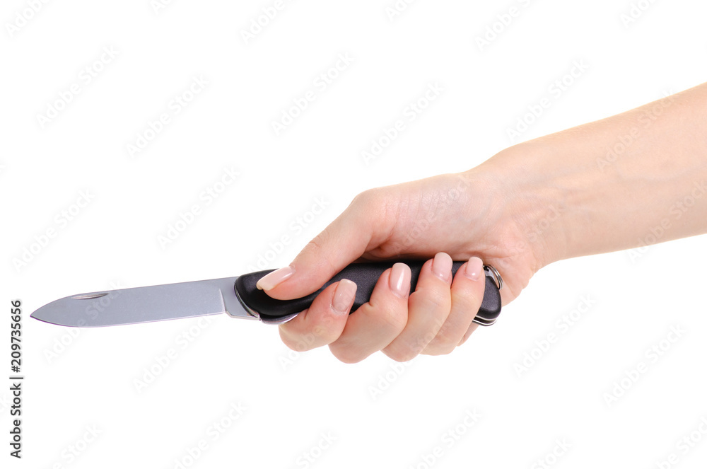 Folding knife in hands on a white background isolation