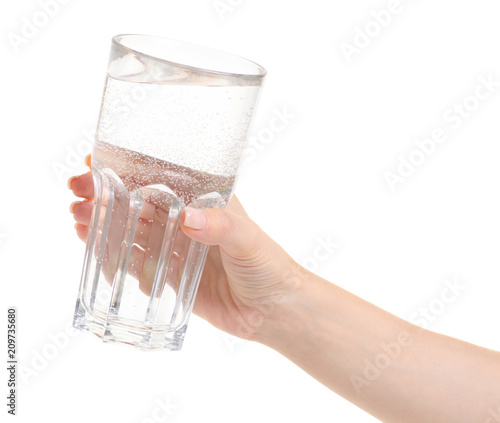 Glass of water in hands on white background isolation