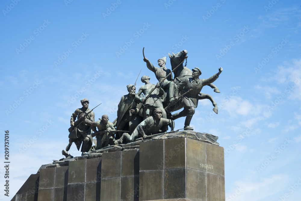 Granite monument to Chapaev in Samara, Russia. Sculptural composition of a group of soldiers. On a Sunny summer day. 17 June 2018