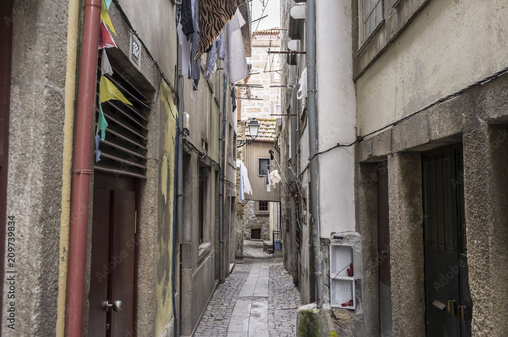 Fototapeta premium Ancient street in historic center of Porto.