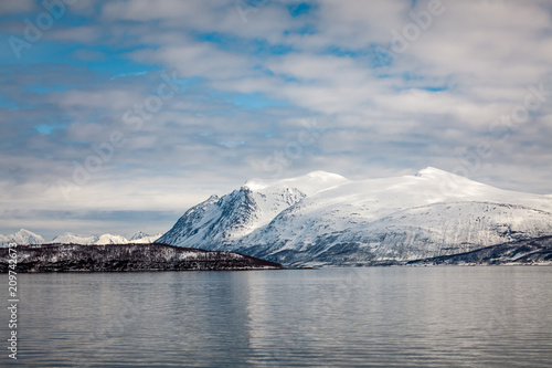 mountain peaks covered with snow in northern Norway