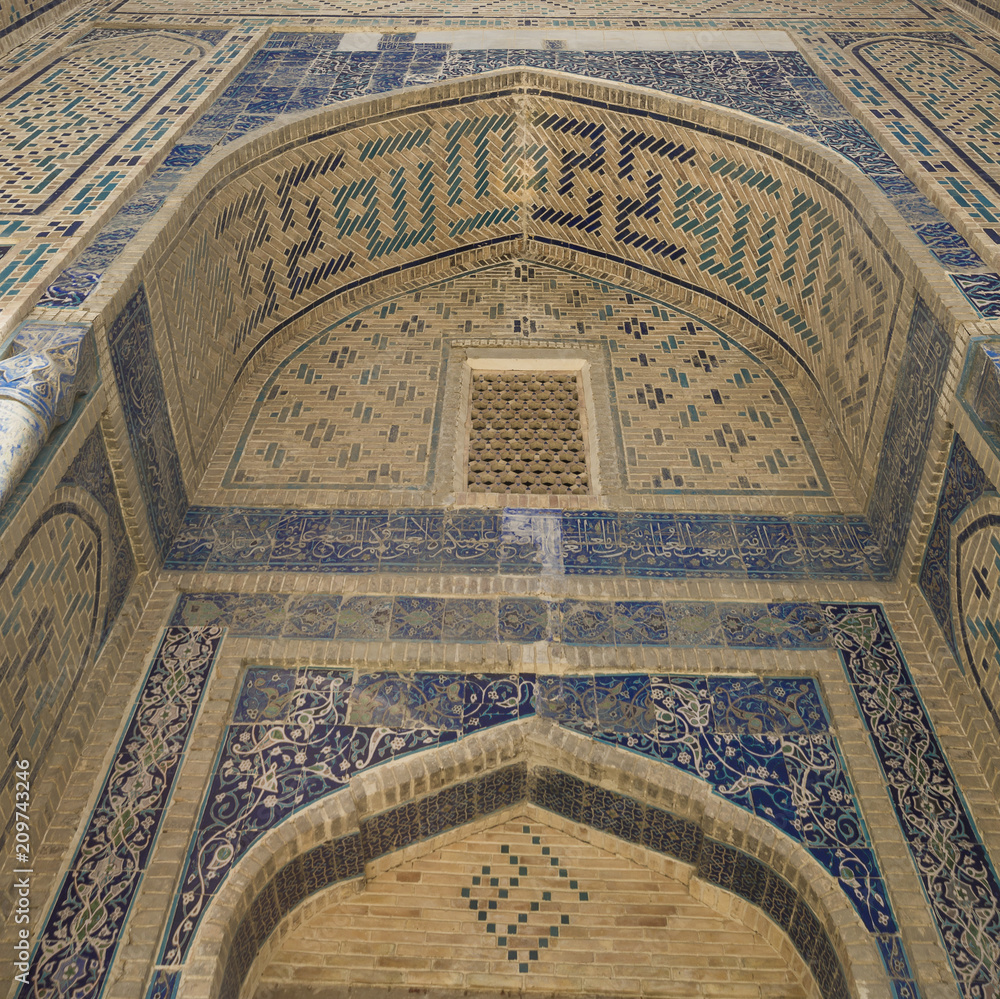 Background from arabesque design inside dome of a mosque in ancient Bukhara, Uzbekistan.