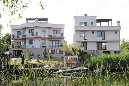 simetric architecture next to a lake  photo