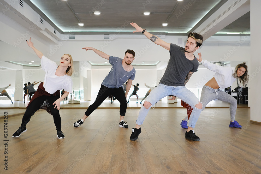 Group of four hip-hop dancers