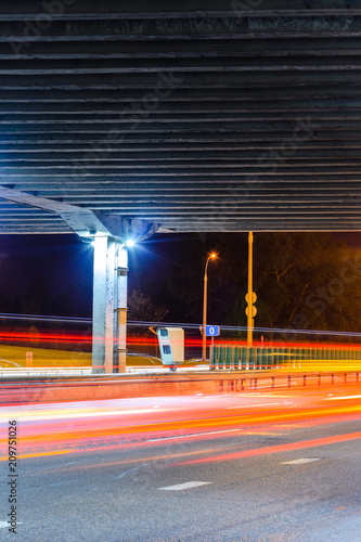 Stationary Car Speed Radar Near a Highway Road. Night Road Traffic Background photo